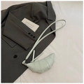Mini mint green croissant crossbody bag with signature pleats on gray suit background - Light Green without Charm