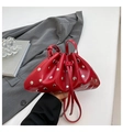 Red drawstring bucket bag with silver studs and a glossy finish for women - Red