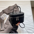Chic black litchi grain bucket crossbody bag with silver hardware and top handle - Black