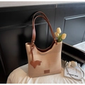 Beige knitted tote bag with brown leather straps and cute pony charm detail - Khaki