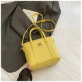 Minimalist bright yellow lychee leather tote bag with top handles and adjustable strap - Yellow