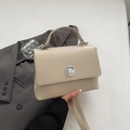 Beige faux leather handbag for women with flap closure and silver round rotating lock - No Pendant / Beige