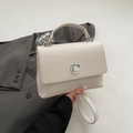Creamy white leather crossbody messenger bag with silver metal lock and top handle - No Pendant / White