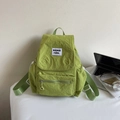 Minimalist light green drawstring backpack in wrinkled nylon with front zipper pocket - Green