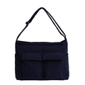 Navy blue quilted nylon crossbody bag with dual front pockets and adjustable strap - Navy Blue