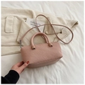Pink textured minimalist handbag with silver hardware and a detachable crossbody strap - Pink