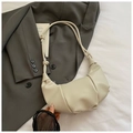 Elegante borsa a nuvola beige plissettata con tracolla annodata in morbida ecopelle - Beige