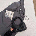 Black crescent hobo bag with embossed lettering, pleated handle and silver chain strap - Black without Pendant