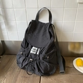 Black checkered nylon backpack with drawstring closure and side zipper pockets - Black Plaid