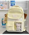 Detail view of cream and white school backpack with transparent window and plush charms - With Ornament / Yellow
