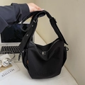 Minimalist black canvas crossbody bag with adjustable wide strap and side pockets - Small / Black