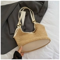 Beige woven straw bag with white leather trim and gold hardware in minimalist style - White