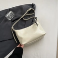 Chic beige underarm bag in premium PU leather with a cute silver heart pendant detail - White with Pendant