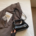 Fashionable black oil wax leather handbag with embossed letters and adjustable strap - Black without Pendant