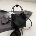 Minimalist black lychee leather bucket bag with top handles and adjustable strap - Black without Pendant