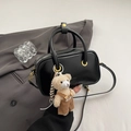 Chic black faux leather handbag with golden rings and cute plush bear charm accessory - With Bear Charm / Black