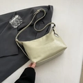Minimalist sage green half-moon underarm bag with adjustable strap and silver leaf charm - Green with Pendant