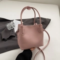Pink lychee-textured bucket bag with dual handles and shoulder strap for women - Pink Without Pendant
