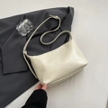 Minimalist cream white crescent shoulder bag in premium matte faux leather finish - White Without Pendant