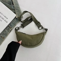 Olive green crescent crossbody bag with wide nylon strap and matte plastic buckle - Green