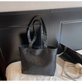 Detail of a black large-capacity tote bag with unique digital pattern for commute - Black