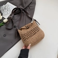 Vintage woven straw shoulder bag with dark brown leather strap and wood button detail - Khaki