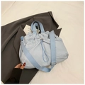 Light blue drawstring canvas tote bag with nylon texture for students and daily commute - Blue