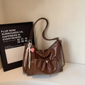 Fashionable dark brown pleated tote bag with pink heart charm and tassel detail - Brown with Pendant