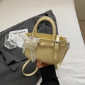 Pale yellow wrinkled faux leather crossbody bag with pearl heart and lace bow detail - Yellow with Pendant