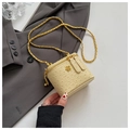 Detail of ostrich leather texture and gold flower clasp on beige chain box bag - Yellow Small