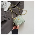 Detail of light green ostrich leather box bag with gold floral buckle and chain strap - Green Small