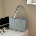 Hellblaue Shopper-Tasche aus Kunstleder mit Schleifendruck und goldener Schnalle - Blau