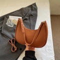 Brown leather crescent shoulder bag with golden hardware and dual detachable straps - Brown