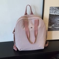 Sac à dos bouffant rose ultra léger pour femme avec logo en métal et texture en nylon - Rose