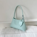 Elegant mint blue woven leather hobo bag with unique side charm for stylish women - Blue