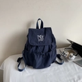 Dark blue nylon backpack with white embroidery for urban casual style and large capacity - Dark Blue