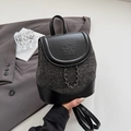 Mini mochila de tweed en negro y gris con cadena metálica y solapa elegante - Negro