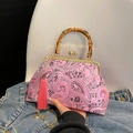 Borsa rosa con ricamo paisley, manico in bambù e tracolla a catena dorata in variante - Rosa