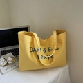 Large yellow canvas tote bag with blue letter embroidery and spacious interior storage - Yellow