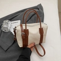 Detail of the canvas and brown leather boston bag with silver hardware on a gray blazer - Off-white