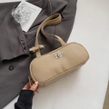 Minimalist beige pebble leather baguette bag with silver twist lock and adjustable strap - Khaki