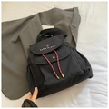 Waterproof black canvas backpack with pink embroidery and red drawstring accents - Black