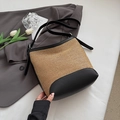 Secchiello intrecciato chic con finiture in pelle nera e design a contrasto - Nero