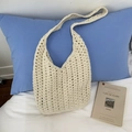 Chic cream white crochet woven tote bag with hollow knit pattern for beach vacations - Beige