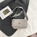Sac bandoulière minimaliste en nylon gris clair avec large sangle réglable pour femme - Gris