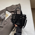 Glossy black patent leather mini bucket bag with cute dog charm and silver strap - Black