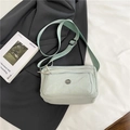 Sac bandoulière vert menthe en nylon léger avec large sangle réglable assortie - Vert