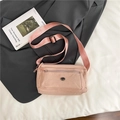 Pink minimalist nylon crossbody bag for women with front zipper and adjustable strap - Pink