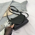 Chic black litchi grain leather bucket bag with star charms and adjustable strap - Black With Pendant