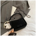 Detail of black velvet shoulder bag with silver chain strap and cute white dog charm decoration - With Pendant / Black